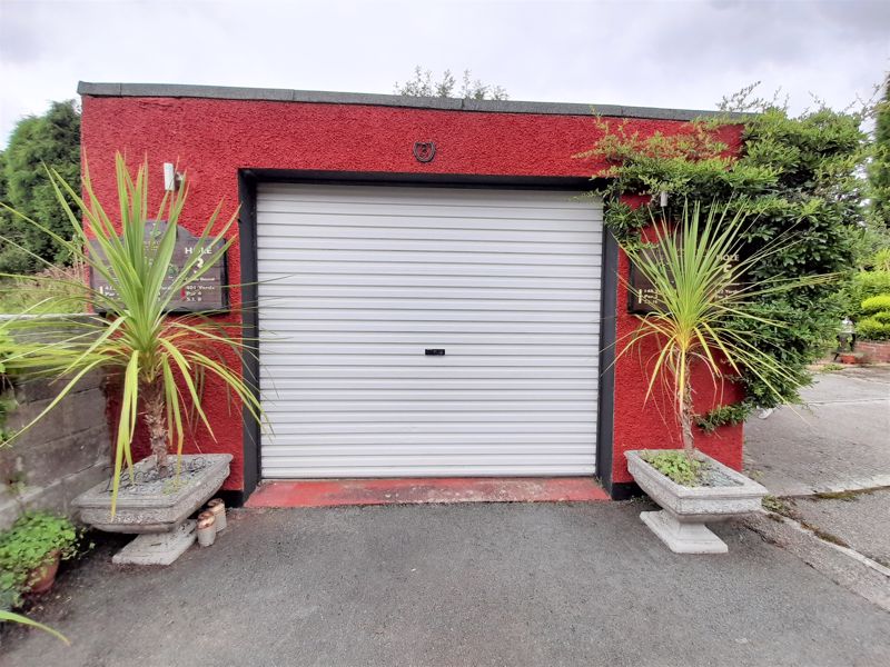 Garage with Inspection Pit and Roller Door